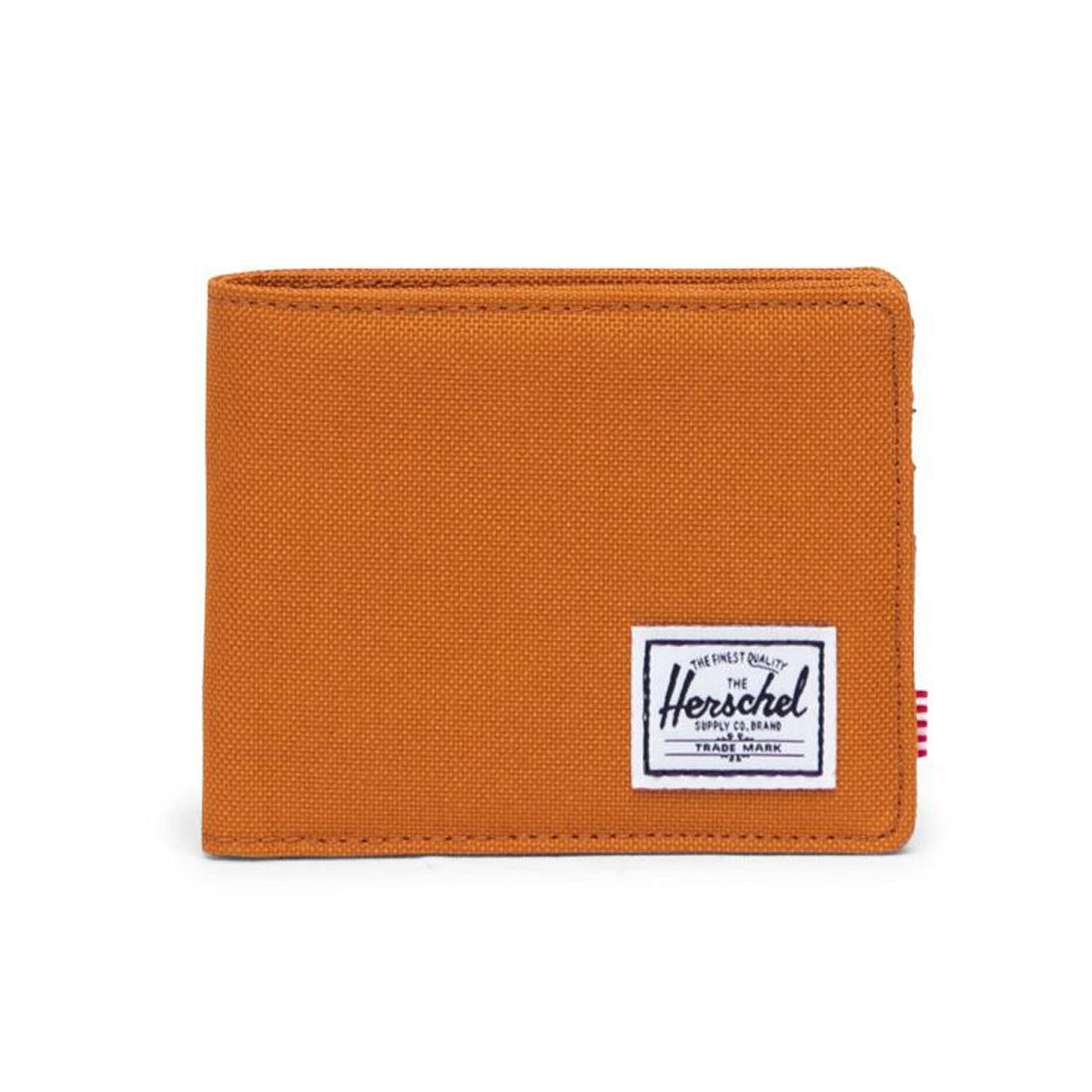 An orange fabric wallet with a white Herschel label on the bottom right corner.