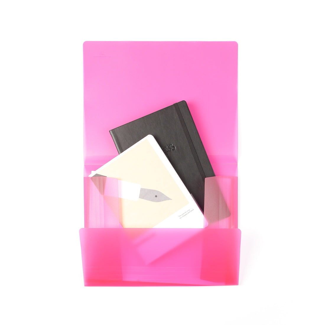A pink folder holds two notebooks: one black and one with a beige cover featuring a stylized pen illustration.