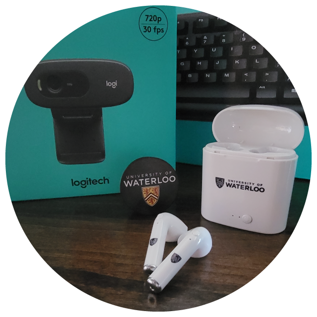 Webcam and UWaterloo headphones displayed on a desk