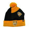 A black and yellow knit beanie with a pom-pom on top and a pair of matching black mittens, both featuring a crest design.