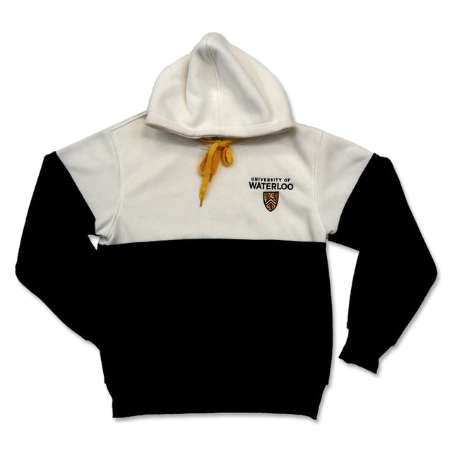 A hooded sweatshirt with a white upper section and a black lower section, featuring the text "UNIVERSITY OF WATERLOO" and a crest on the left chest, with yellow drawstrings.