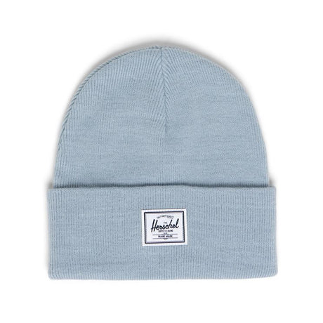 Light blue beanie hat with a folded cuff and a white Herschel label.