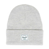 Light gray knit beanie with folded cuff and Herschel logo patch.
