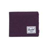 Purple wallet with a white Herschel logo patch on the front.