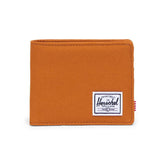 An orange fabric wallet with a white Herschel label on the bottom right corner.