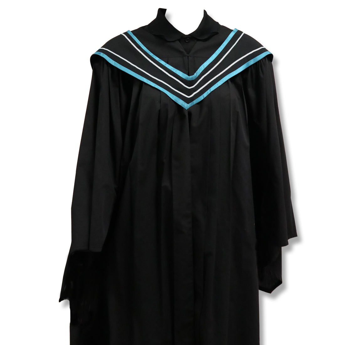 Black graduation gown with blue and turquoise chevron trim on the yoke.