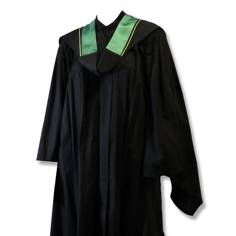 A black graduation gown with a green and yellow collar.