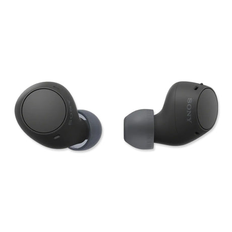 Two black Sony wireless earbuds, one with a silicone ear tip attached, displayed from a slight angle.
