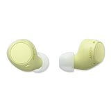 A pair of light green Sony wireless earbuds with silicone tips.