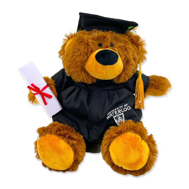 A brown teddy bear wearing a black graduation gown and cap with a yellow tassel, featuring the "University of Waterloo" logo.