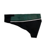 A black and green women's bikini bottom with a decorative white trim.