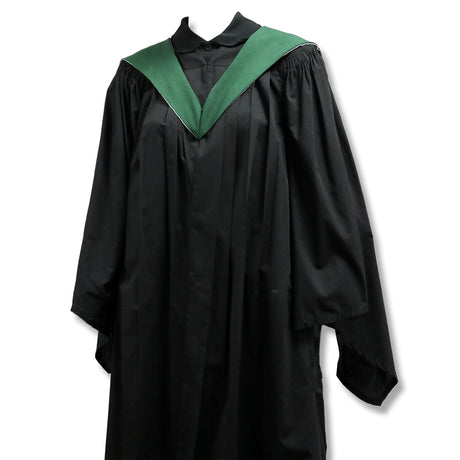 A black graduation gown with a green collar.