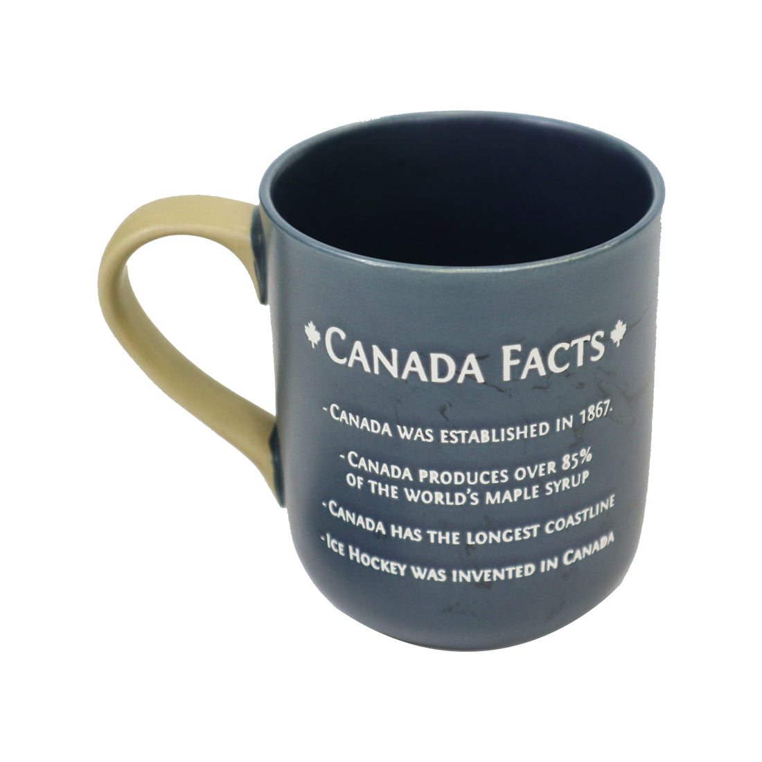 A blue mug with a beige handle displaying "Canada Facts" and four bullet points about Canada.